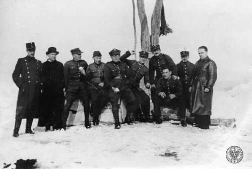 A group of officers of the Polish Army interned after the defence war of 1939 at the Ujedörek-puszta camp (Hungary), February 1940. From the left: captain Kelemam (Hungarian camp commander), priest Żelechowski, captain Antoni Bardecki, lieutenant doctor Faliszewski, lieutenant Poertygor (?), second lieutenant Nowarycz (?), Lorenz, second lieutenant Haydnik, second lieutenant Czesław Cichoszewski, Asc (Hungarian). Photo print gifted by Wanda Cichoszewska from Nowy Sącz, during the war a teacher a