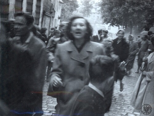 Zielona Góra, 30 maja 1960. Uciekający przed milicjantami atakującymi obrońców Domu Katolickiego. Fot. z zasobu IPN