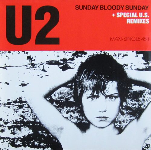 Okładka płyty winylowej (singla) z napisem U2 i zdjęciem chłopca