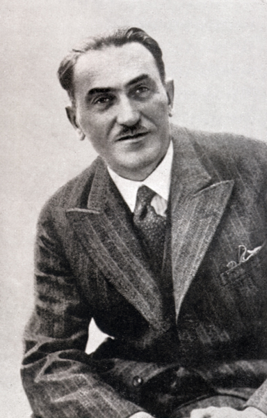 Zdjęcie portretowe Tadeusza Boya-Żeleńskiego. Mężczyzna w garniturze.