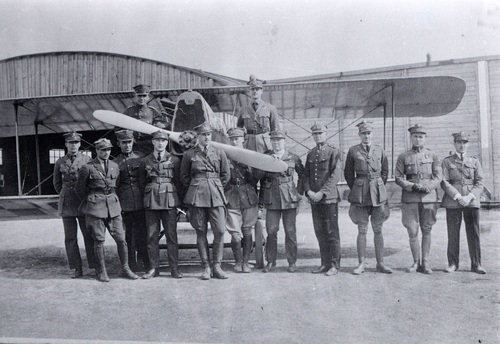 Officers of the 7th Air Escadrille standing in front of the Ansaldo A.1 Balilla. Standing from the left: Jerzy Weber; Antoni Poznański; Zbigniew Orzechowski; Edward C. Corsi; George M. Crawford; John C. Speaks; Elliot W. Chess; Earl Evans; John I. Maitland; Aleksander Seńkowski; Thomas Garlick. On the right wheel: Władysław Konopka. On the left wheel: Kenneth M. Murray. The photograph was taken after the end of the Polish-Bolshevik war. Photo from the Polish Air Force Museum in Cracow